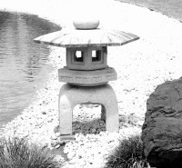 lantern and white pebbles crop