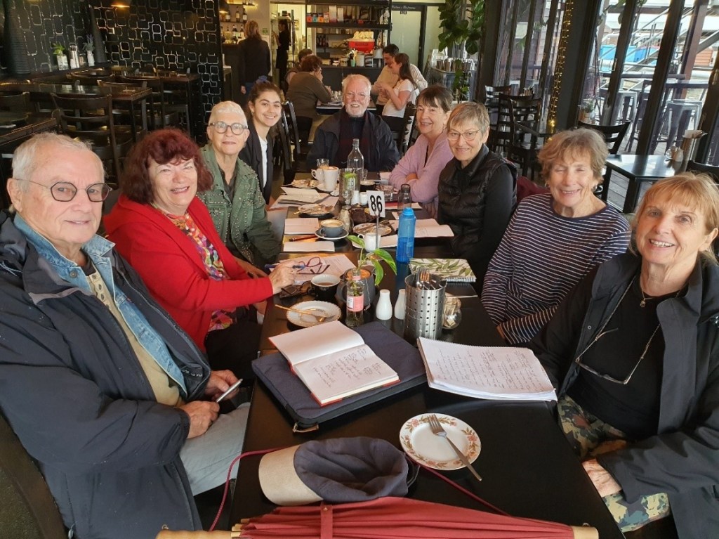 Photo of the group in a cafe